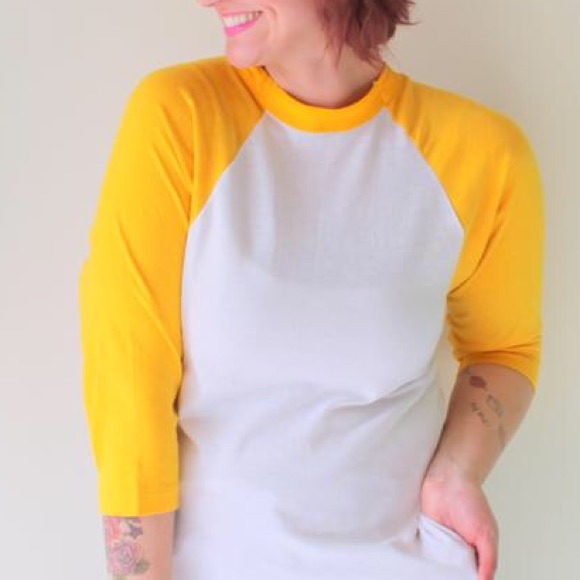 yellow and white baseball tee